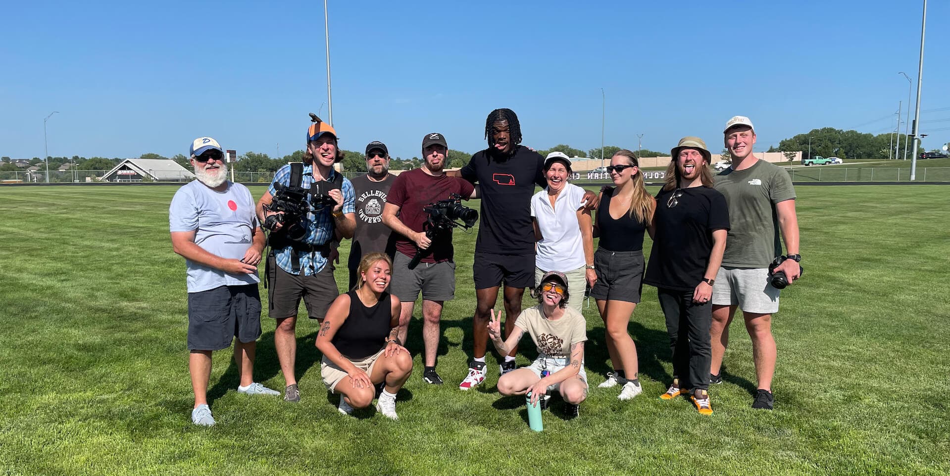 Jeff Sims posing with the production crew after wrapping on the Jeff Sims Combo video production